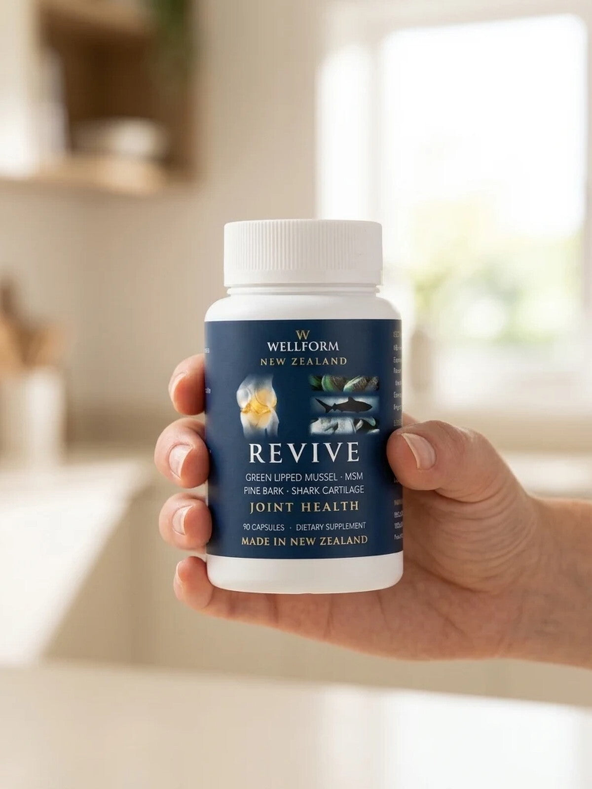 WELLFORM REVIVE bottle in hand
